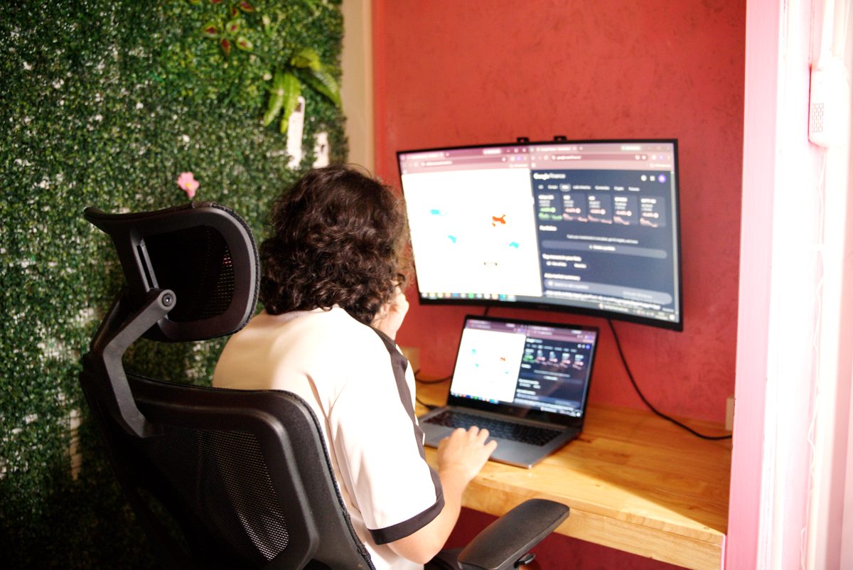 Desk nook by the green wall