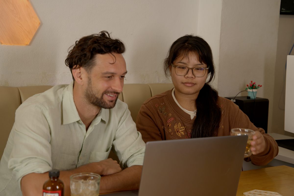Members working together at a shared table